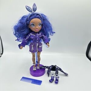 Rainbow High Krystal Bailey Doll With Outfit, Stand And Extra Clothing Included.